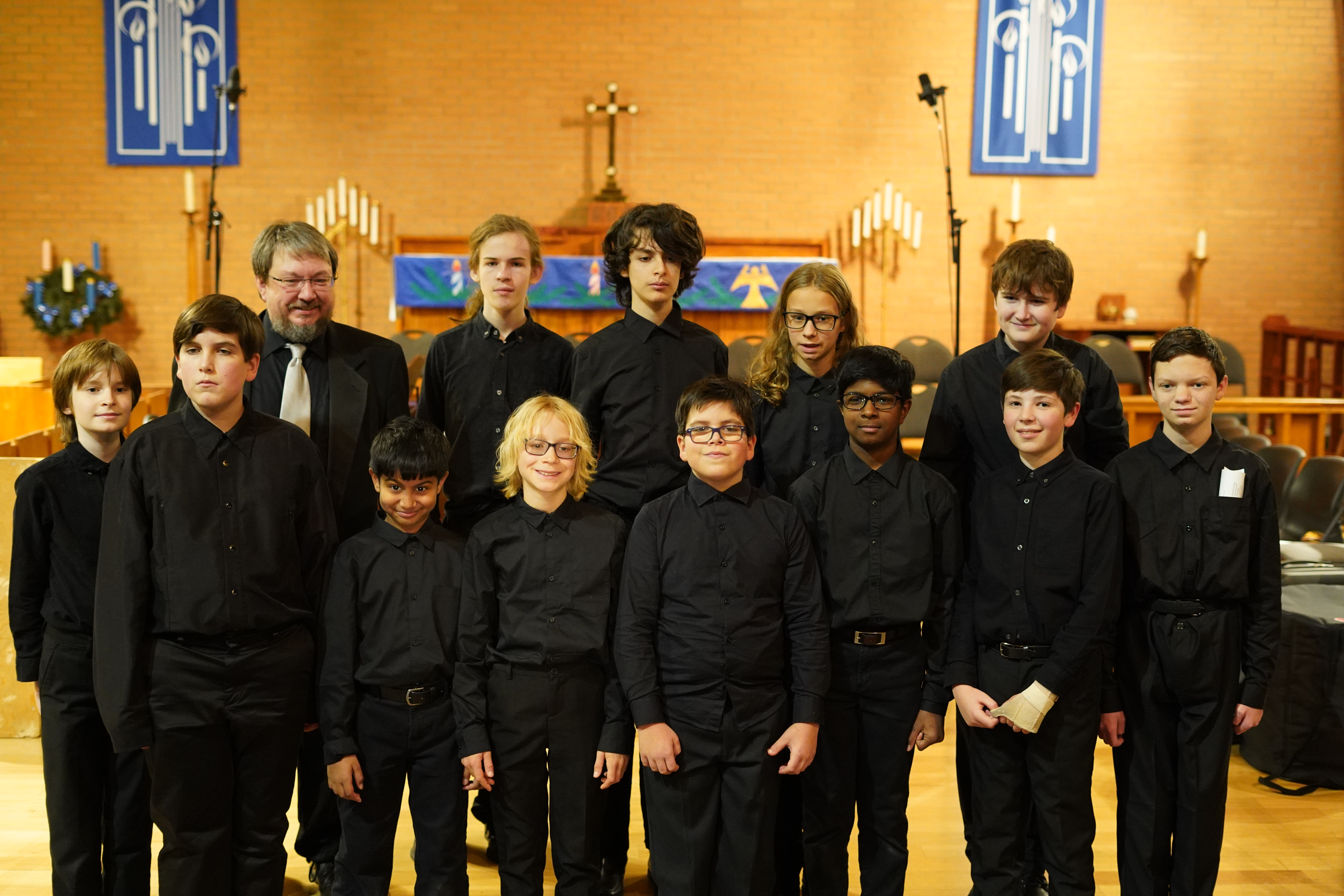 Group photo of the Ottawa Boys Choir and conductor
