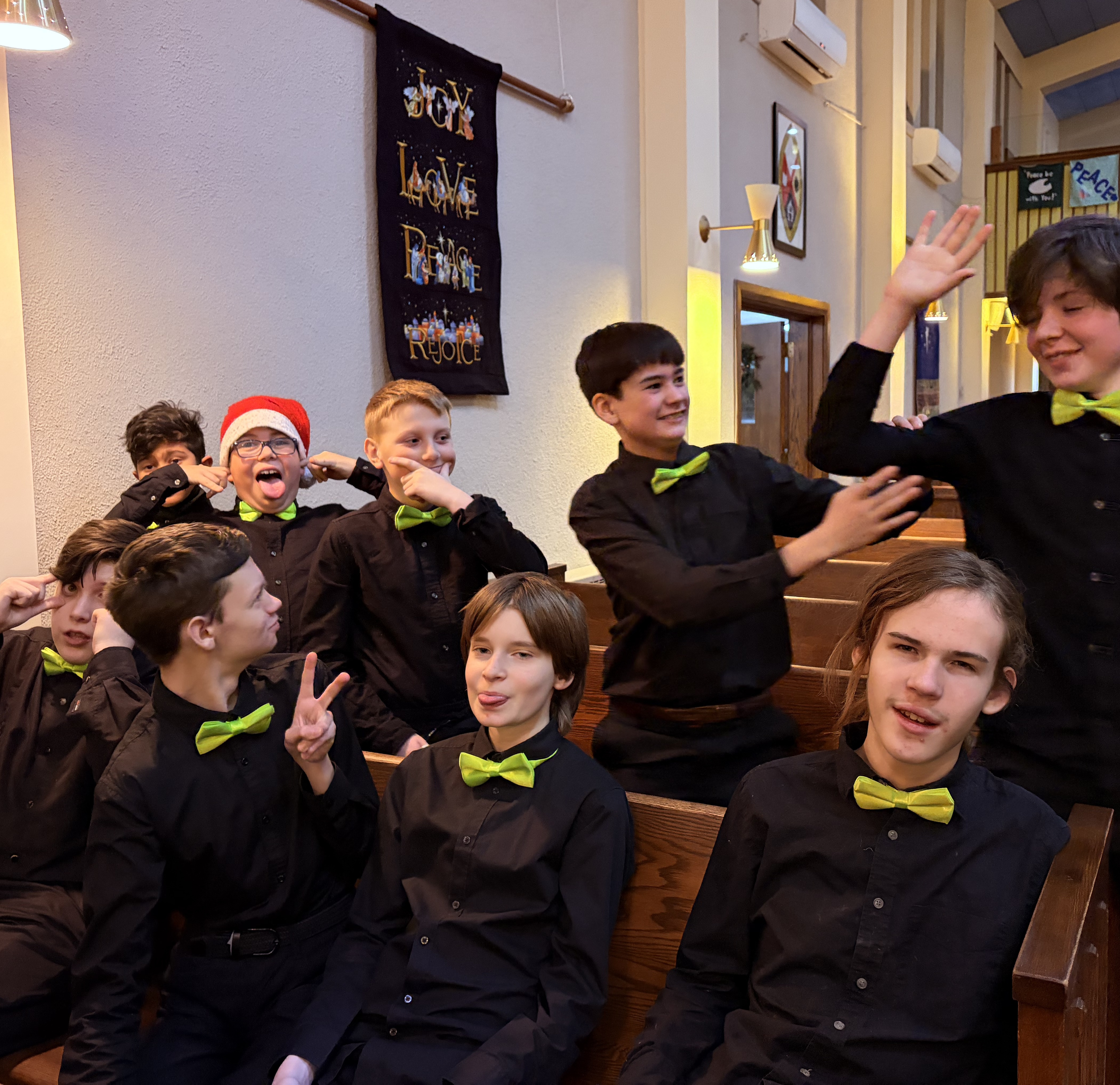Group photo of the choir in 2025 waiting for Christmas concert